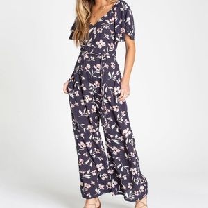 Billabong fluttering heart  jumpsuit! Runs a little big. More like a small/med.